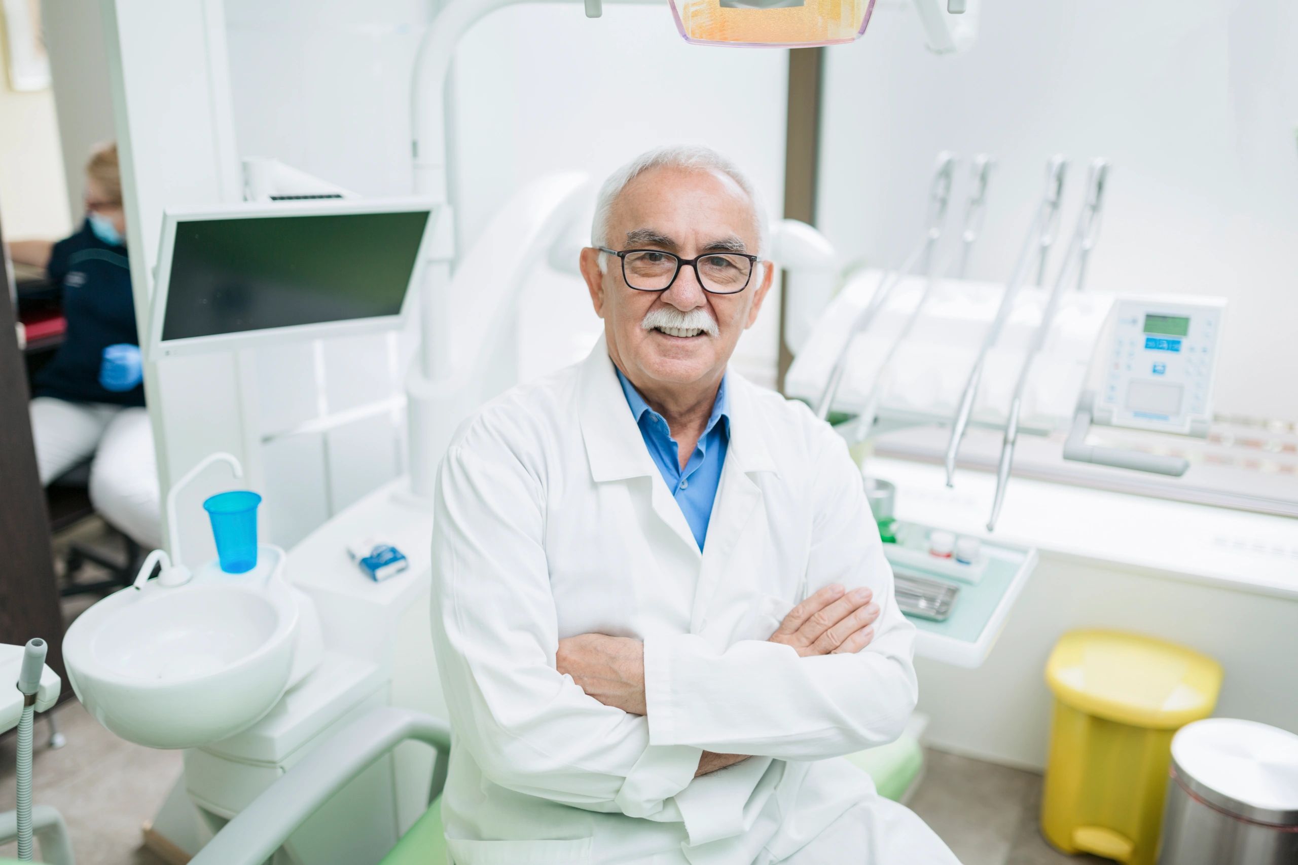 dental office manager reviewing documents
